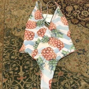 Thong swimsuit or bodysuit. Thongs are hot hot hot